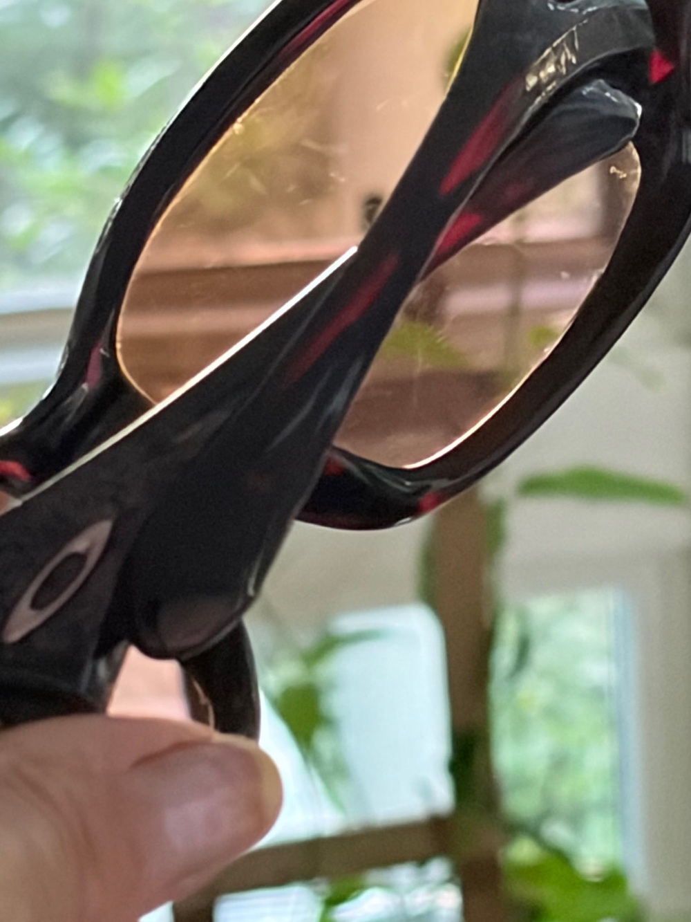 Oakley Black Sunglasses with Rose-Tinted Lenses Ravishing